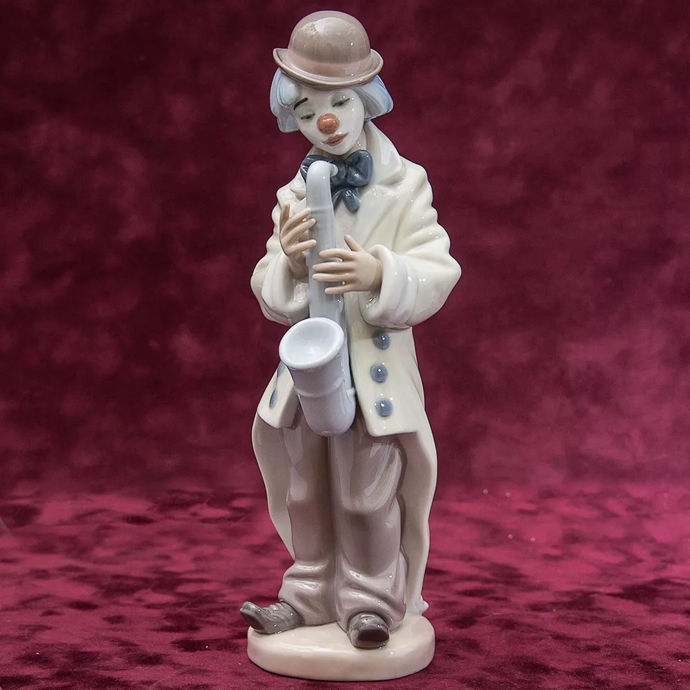 Фарфоровая статуэтка «Клоун с cаксофоном» Lladro, Испания - 1987 год.