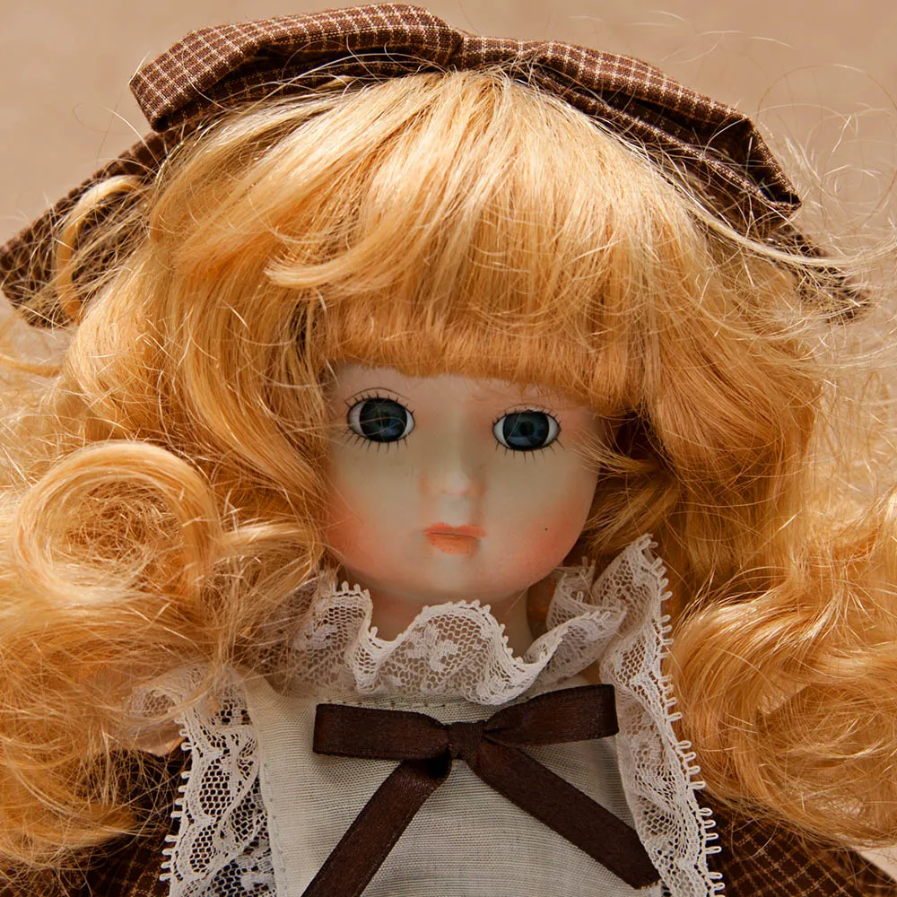 Коллекционная фарфоровая кукла №7  Н - 31 см.