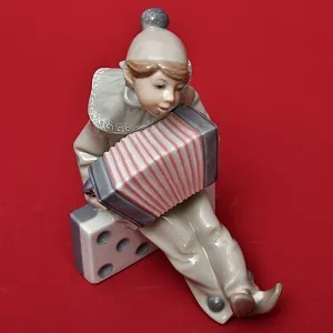 Коллекционная Фарфоровая статуэтка «Маленький клоун с аккордеоном», Lladro Испания, 1971 - 1981 годы.
