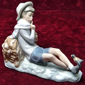 Коллекционная Фарфоровая статуэтка «Мальчик с птицей», Lladro Испания - 1970 год.