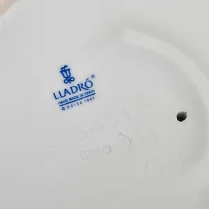 Коллекционная Фарфоровая статуэтка «Мальчик с собакой и птицей», Lladro Испания. 