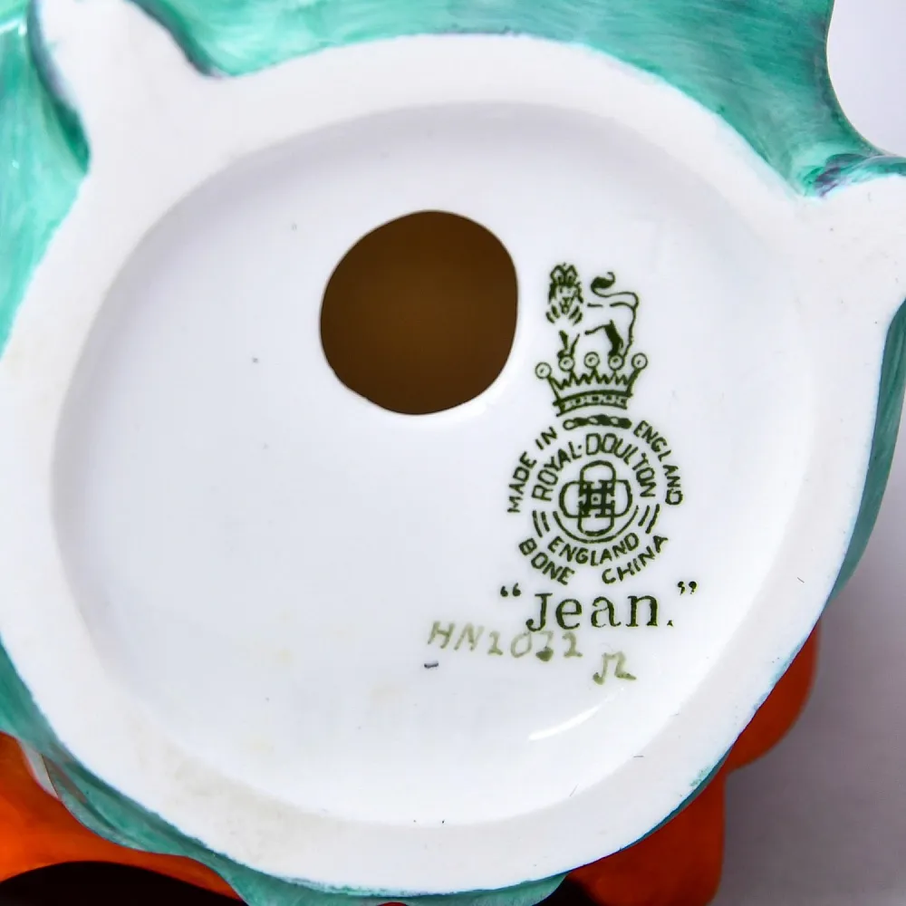 Коллекционная Фарфоровая статуэтка «Джин. Девушка в зеленом платье», Royal Doulton Англия.