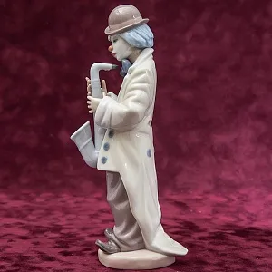 Фарфоровая статуэтка «Клоун с cаксофоном» Lladro, Испания - 1987 год.