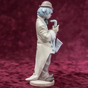 Фарфоровая статуэтка «Клоун с cаксофоном» Lladro, Испания - 1987 год.