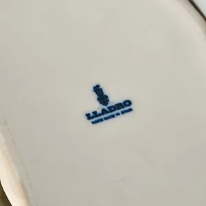 Коллекционная Фарфоровая статуэтка «Продавец фарфора»,  Lladro Испания - 1974 год.