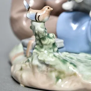 Коллекционная Фарфоровая статуэтка «Мальчик с собакой и птицей», Lladro Испания. 