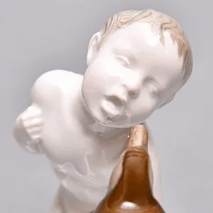 Антикварная Фарфоровая статуэтка «Мальчик, пингвин и краб», ROSENTHAL Германия, первая половина ХХ века.