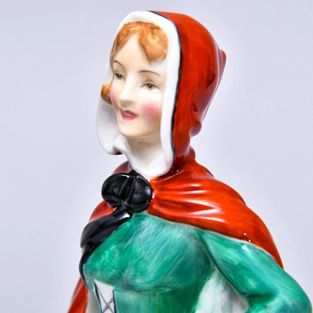 Коллекционная Фарфоровая статуэтка «Джин. Девушка в зеленом платье», Royal Doulton Англия.