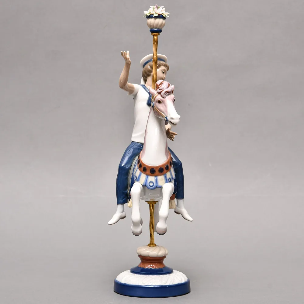Коллекционная Фарфоровая статуэтка «Мальчик в матроске на карусельной лошадке», Lladro Испания. 