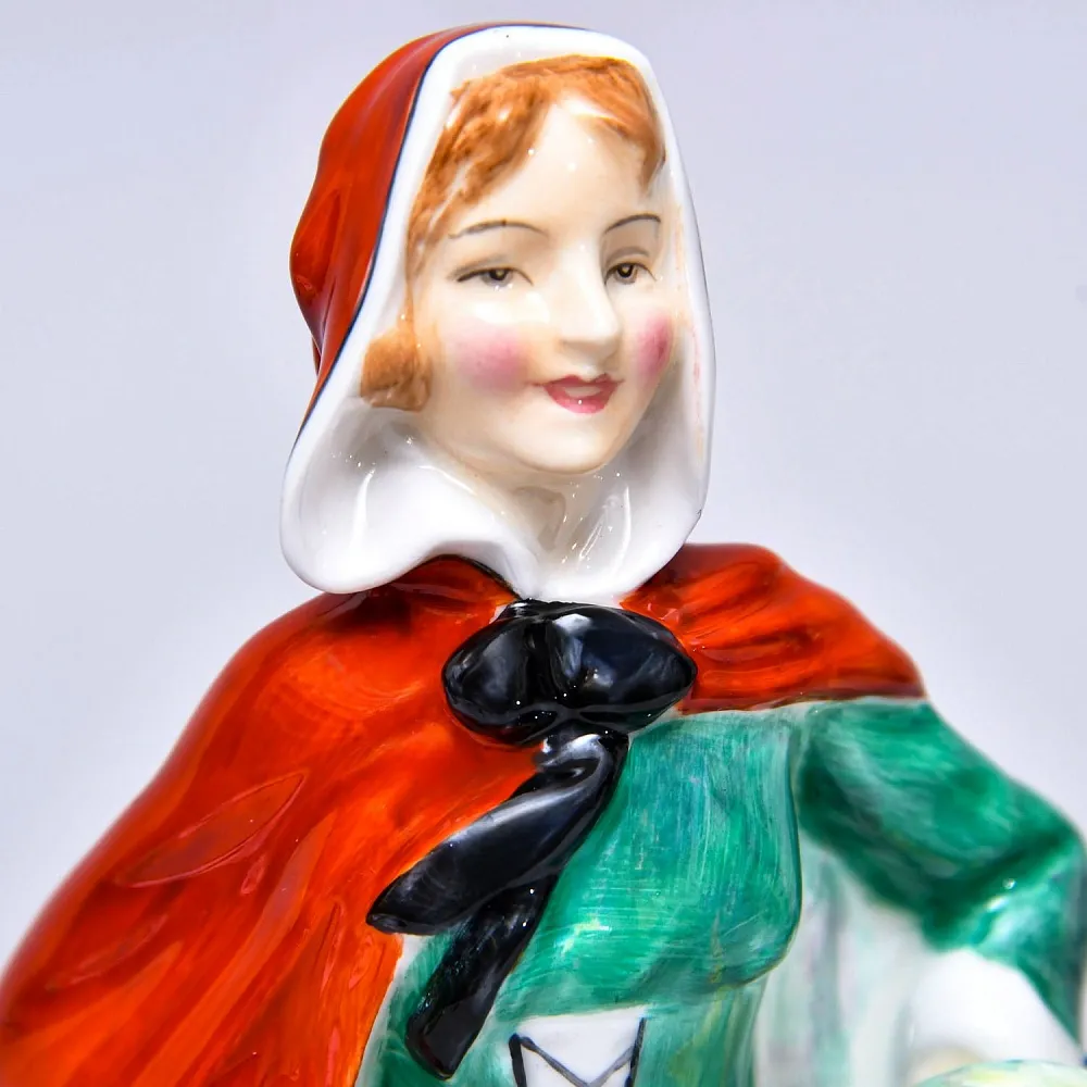 Коллекционная Фарфоровая статуэтка «Джин. Девушка в зеленом платье», Royal Doulton Англия.