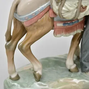 Коллекционная Фарфоровая статуэтка «Продавец фарфора»,  Lladro Испания - 1974 год.