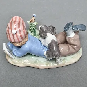 Коллекционная Фарфоровая статуэтка «Мальчик с собакой и птицей», Lladro Испания. 