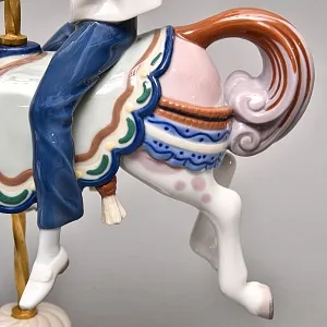 Коллекционная Фарфоровая статуэтка «Мальчик в матроске на карусельной лошадке», Lladro Испания. 