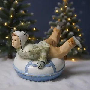 Авторская Коллекционная Фарфоровая Статуэтка «Мальчик на Тюбинге», Дулёво Россия. 