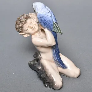 Коллекционная Фарфоровая статуэтка «Фавн с попугаем», Royal Copenhagen Дания, 50-е годы.