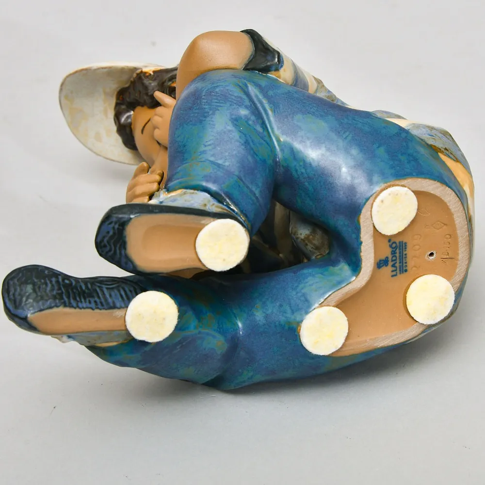 Коллекционная Фарфоровая статуэтка «Длинный день», Lladro серия Грес, Испания.