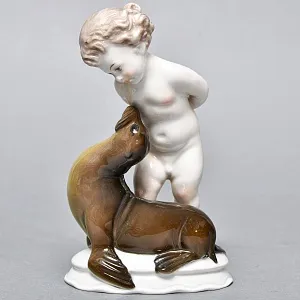 Коллекционная Фарфоровая статуэтка «Мальчик и тюлень», ROSENTHAL Германия, 1943 - 1948 годы.