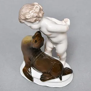 Коллекционная Фарфоровая статуэтка «Мальчик и тюлень», ROSENTHAL Германия, 1943 - 1948 годы.