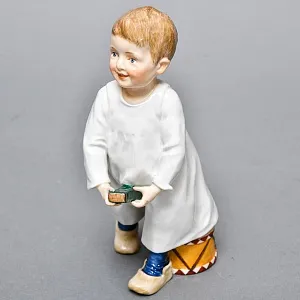 Коллекционная Фарфоровая статуэтка «Дети Хеншеля. Ребёнок с палочкой и барабаном», Meissen Германия.