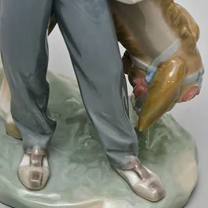 Коллекционная Фарфоровая статуэтка «Продавец фарфора»,  Lladro Испания - 1974 год.