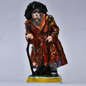 Коллекционная Фарфоровая статуэтка «Нищие и Бродяги. Нищий», Volkstedter Германия.