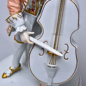 Коллекционная Фарфоровая статуэтка «Музыкант. Виолончелист», SITZENDORF Германия.