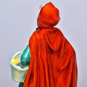 Коллекционная Фарфоровая статуэтка «Джин. Девушка в зеленом платье», Royal Doulton Англия.