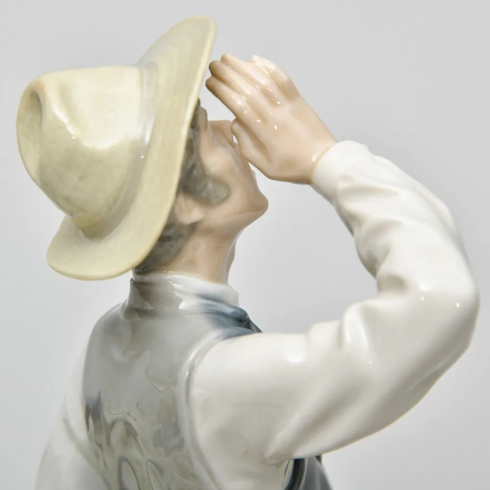 Коллекционная Фарфоровая статуэтка «Продавец фарфора»,  Lladro Испания - 1974 год.