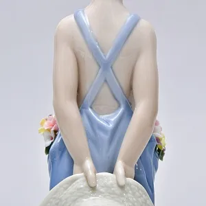 Авторская Фарфоровая статуэтка «Мальчик с цветами», Lladro Испания, 1997 год.