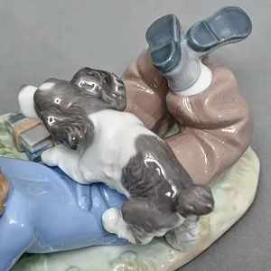 Коллекционная Фарфоровая статуэтка «Мальчик с собакой и птицей», Lladro Испания. 