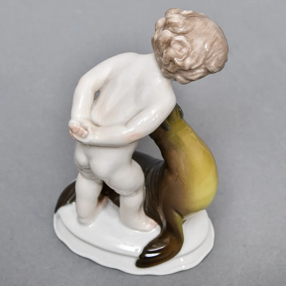 Коллекционная Фарфоровая статуэтка «Мальчик и тюлень», ROSENTHAL Германия, 1943 - 1948 годы.