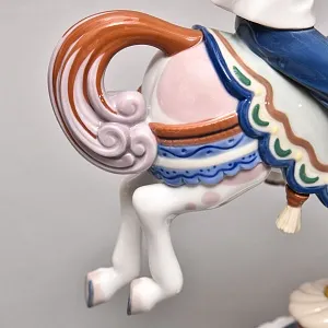 Коллекционная Фарфоровая статуэтка «Мальчик в матроске на карусельной лошадке», Lladro Испания. 