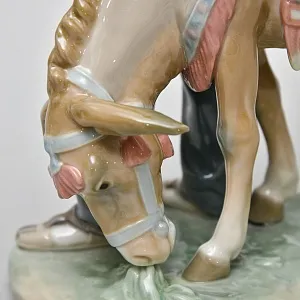 Коллекционная Фарфоровая статуэтка «Продавец фарфора»,  Lladro Испания - 1974 год.