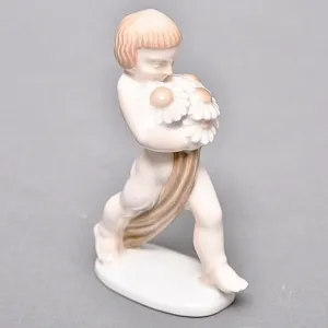 Антикварная Фарфоровая статуэтка «Вестник весны или Мальчик с ромашками», ROSENTHAL Германия - 1923 год.