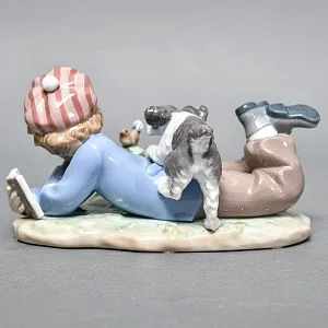 Коллекционная Фарфоровая статуэтка «Мальчик с собакой и птицей», Lladro Испания. 