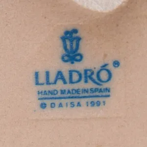 Коллекционная Фарфоровая статуэтка «Девочка с воробьем» серия Грес Lladro, Испания - 1991 год.