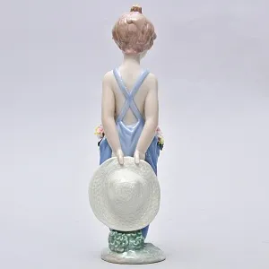 Авторская Фарфоровая статуэтка «Мальчик с цветами», Lladro Испания, 1997 год.