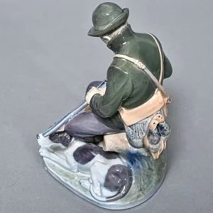 Коллекционная Фарфоровая статуэтка «Охотник  с собакой», Royal Copenhagen Дания, 1992 - 1999 годы. 
