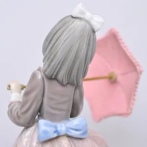 Коллекционная Фарфоровая статуэтка «Девочка с кружевным зонтиком. Джулия», Lladro Испания.