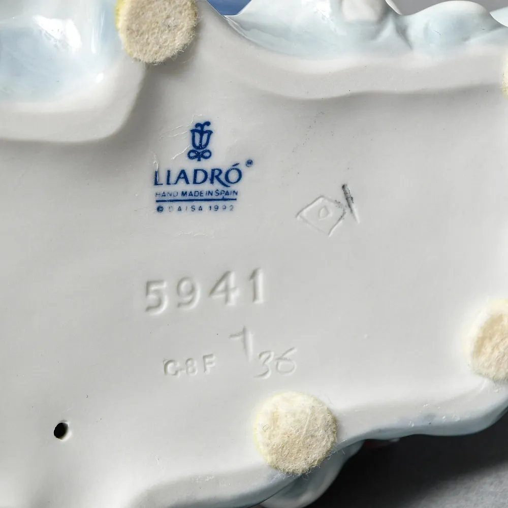 Коллекционная Фарфоровая статуэтка «Двое в лодке», Lladro Испания - 1992 год.