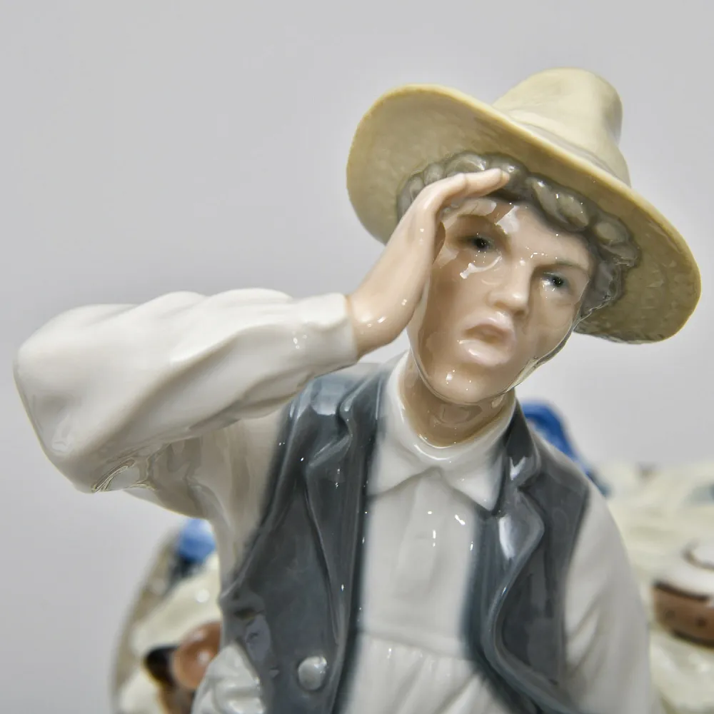 Коллекционная Фарфоровая статуэтка «Продавец фарфора»,  Lladro Испания - 1974 год.