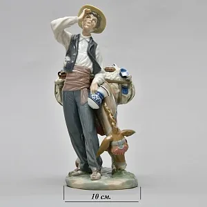 Коллекционная Фарфоровая статуэтка «Продавец фарфора»,  Lladro Испания - 1974 год.