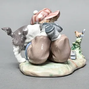 Коллекционная Фарфоровая статуэтка «Мальчик с собакой и птицей», Lladro Испания. 