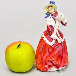 Коллекционная Фарфоровая статуэтка «Рождественское утро. Девушка с муфтой» , Royal Doulton Англия.