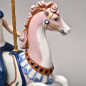 Коллекционная Фарфоровая статуэтка «Мальчик в матроске на карусельной лошадке», Lladro Испания. 