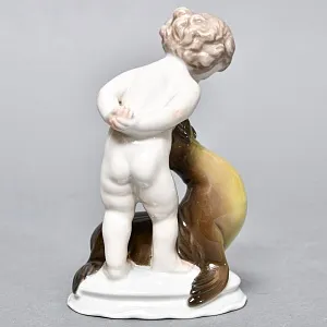 Коллекционная Фарфоровая статуэтка «Мальчик и тюлень», ROSENTHAL Германия, 1943 - 1948 годы.