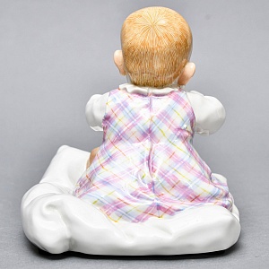 Коллекционная Фарфоровая статуэтка «Дети Хеншеля. Ребёнок, сидящий на подушке», Meissen Германия. 