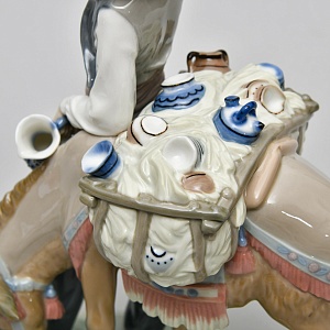 Коллекционная Фарфоровая статуэтка «Продавец фарфора»,  Lladro Испания - 1974 год.