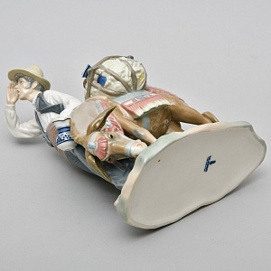 Коллекционная Фарфоровая статуэтка «Продавец фарфора»,  Lladro Испания - 1974 год.